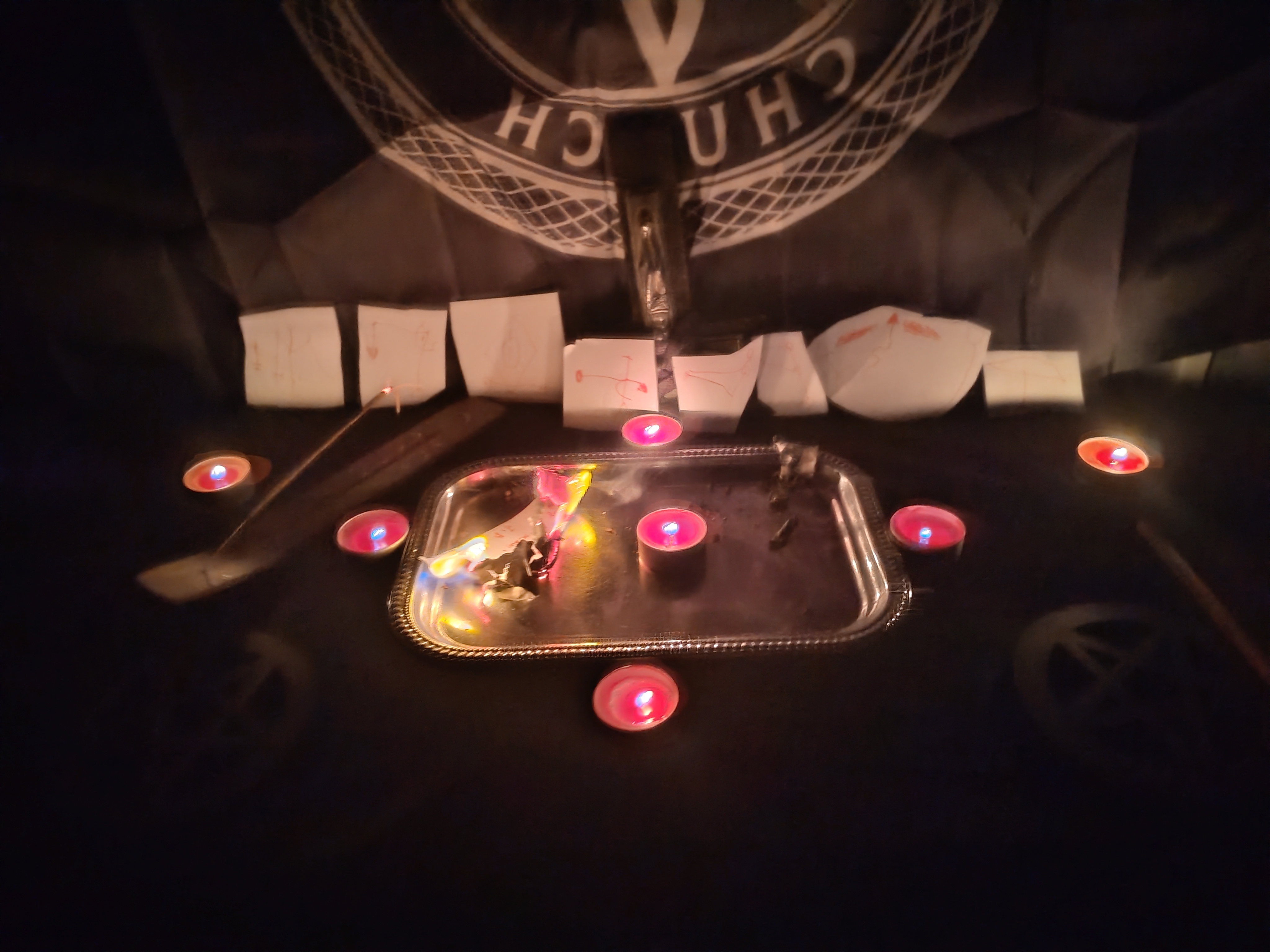 A candle-lit working space of the Diale Lodge
