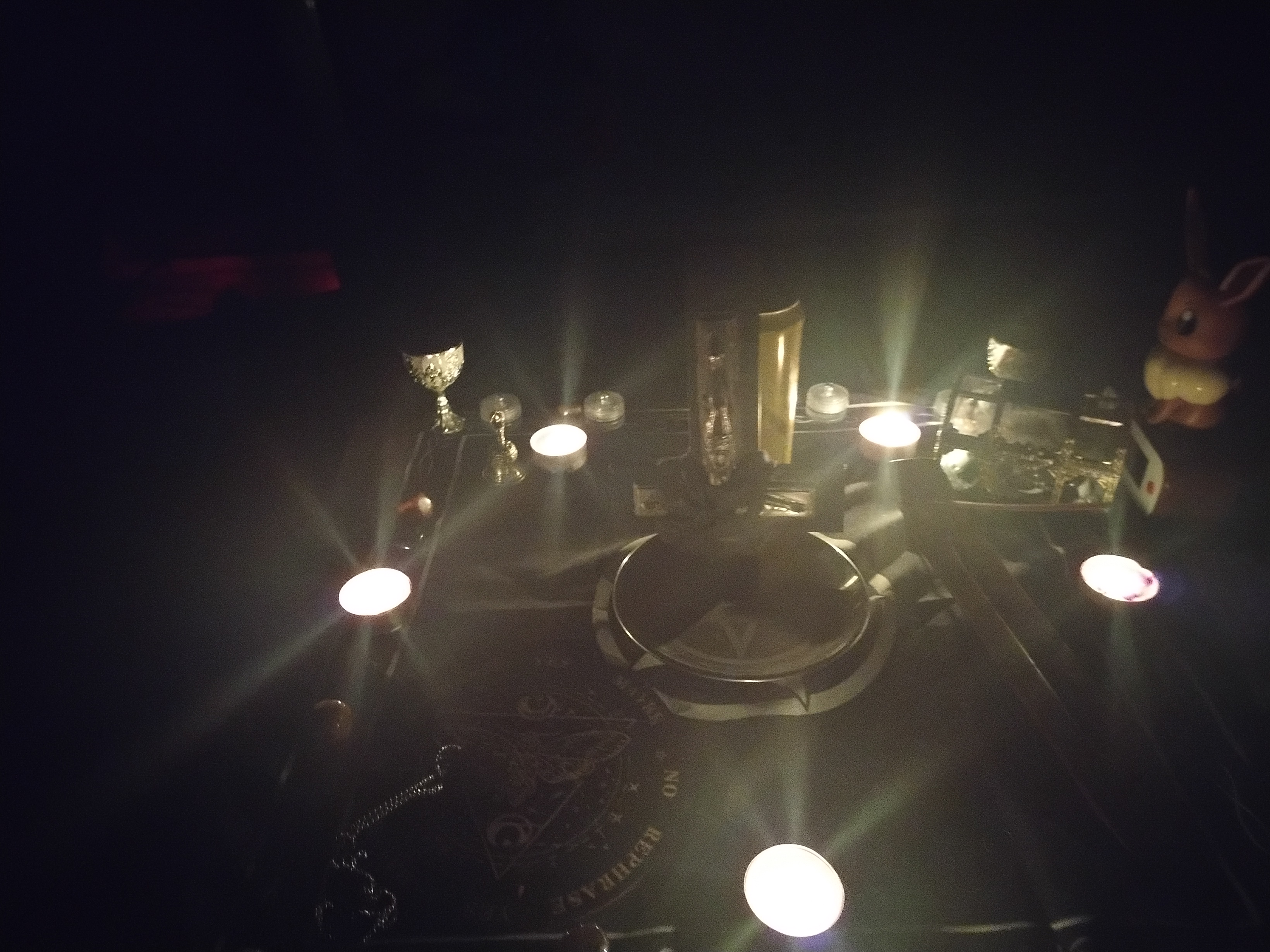 Candle-lit devotional table